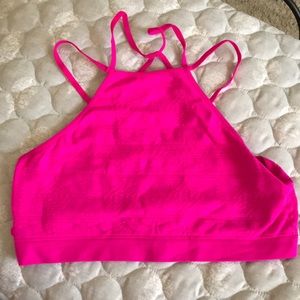 Neon pink halter sports bra